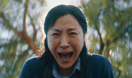 A shot of Michelle Yeoh from Everything Everywhere All at Once, animating between alternate universe versions of the same frame, the seamless blend Stable Diffusion produces.